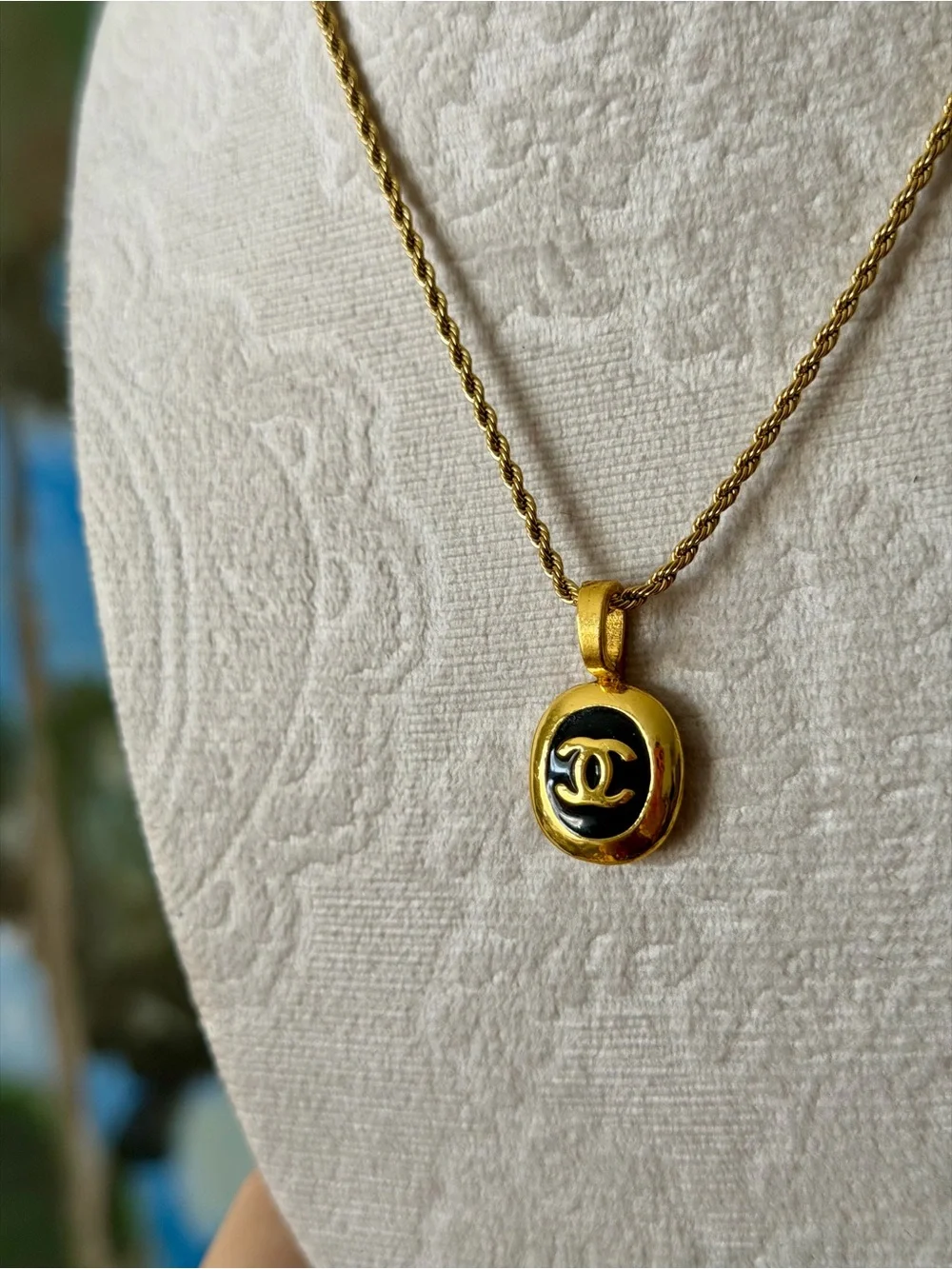CHANEL Gold and Black Oval CC Pendant Necklace on Rope Chain